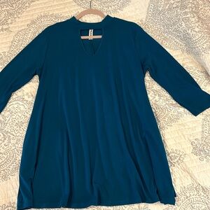 Swing tunic with v-neck cutout
